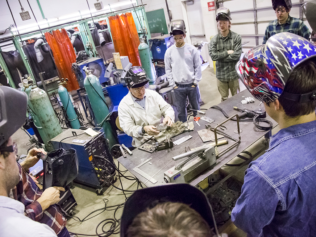 Students learning how to weld.